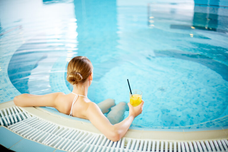 swim spa and a woman relaxing