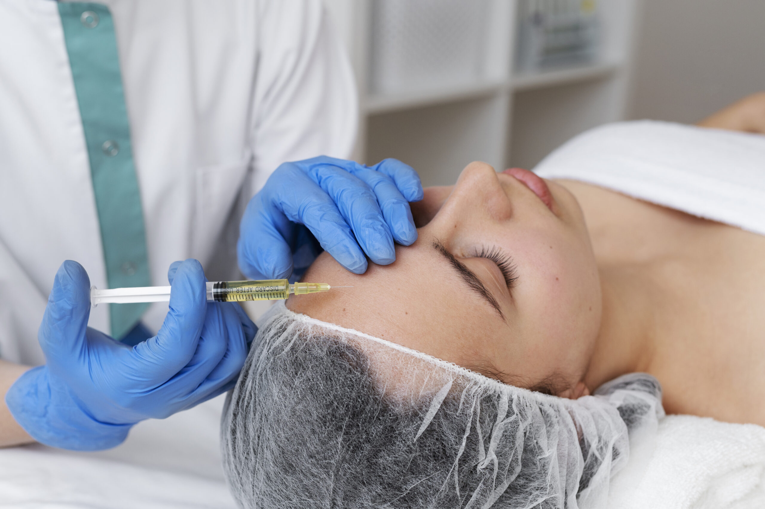Esthetician with client